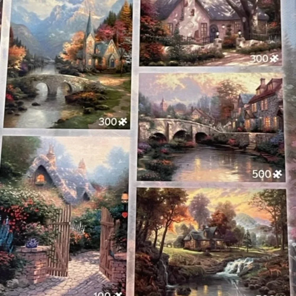 Thomas Kinkade set of 10 beautiful puzzles in one box